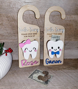Make your child's tooth-losing experience even more magical with this Tooth Fairy Door Hanger, crafted with laser-cut birch wood and acrylic paint! Choose your hanger with a boy or girl design, and personalize with a name – or leave blank to use for the entire family. Triple layer "tooth cup" keeps money safe and secure - though we don't suggest leaving it there for too long! Make every tooth loss a special one!