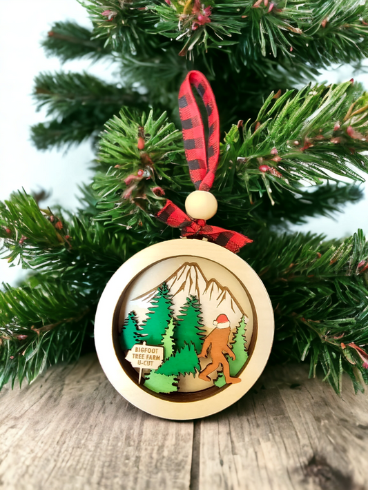 This one-of-a-kind Big Foot Tree Farm Stacked Ornament will have your friends and family do a double take! Hand painted and crafted with seven layers of birch wood, it will bring a touch of unique whimsy to your holiday decor. Bigfoot U-Cut Tree Farm is ready to make your holiday decor just a little bit more special..