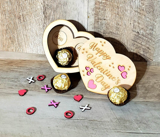 Treat your Valentine to this elegant heart-shaped chocolate box! Meticulously crafted from Baltic Birch Plywood and finished with wood stain and acrylic paint accents, this charming box contains 3 pieces of chocolate with unique messages of love. Measuring 4.7"x3.8", it will arrive in 5-7 days for your romantic celebration.
