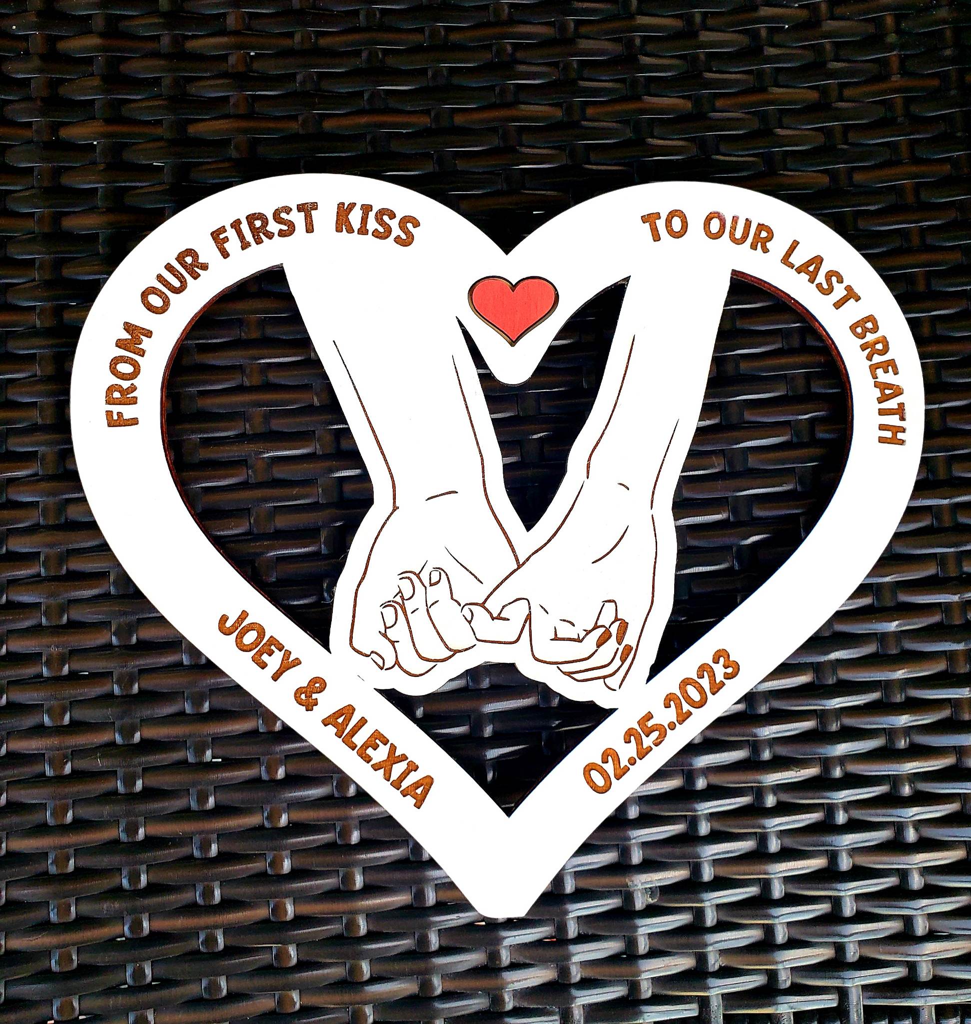  This unique gift is ideal for the newly married or engaged couple. Boasting a 12.5" x 11" size, the customized sign is cut from Birch wood and professionally hand-painted with white acrylic paint. Orders usually ship within 5-7 days of being placed and can be personalized with the couple's name and date.