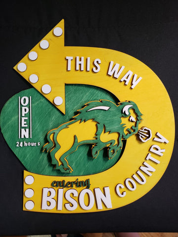 Our Custom Bison Country sign is the perfect way to show off your love of bison. It is laser cut from birch wood and made with five layers to create a unique, eye-catching design measuring approximately 12" tall. Each one is custom designed and ready to ship within 5 to 7 days.