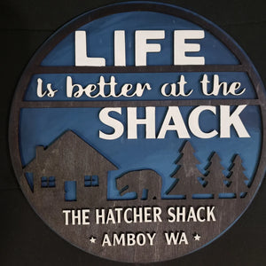 Our life is better at the Shack Home Decor Sign is the perfect addition to any home. It is 12" round and made from hand-painted Baltic Birch wood with personalized lettering, making it a unique and treasured item. Each sign is crafted with care and ships in 5-7 days.
