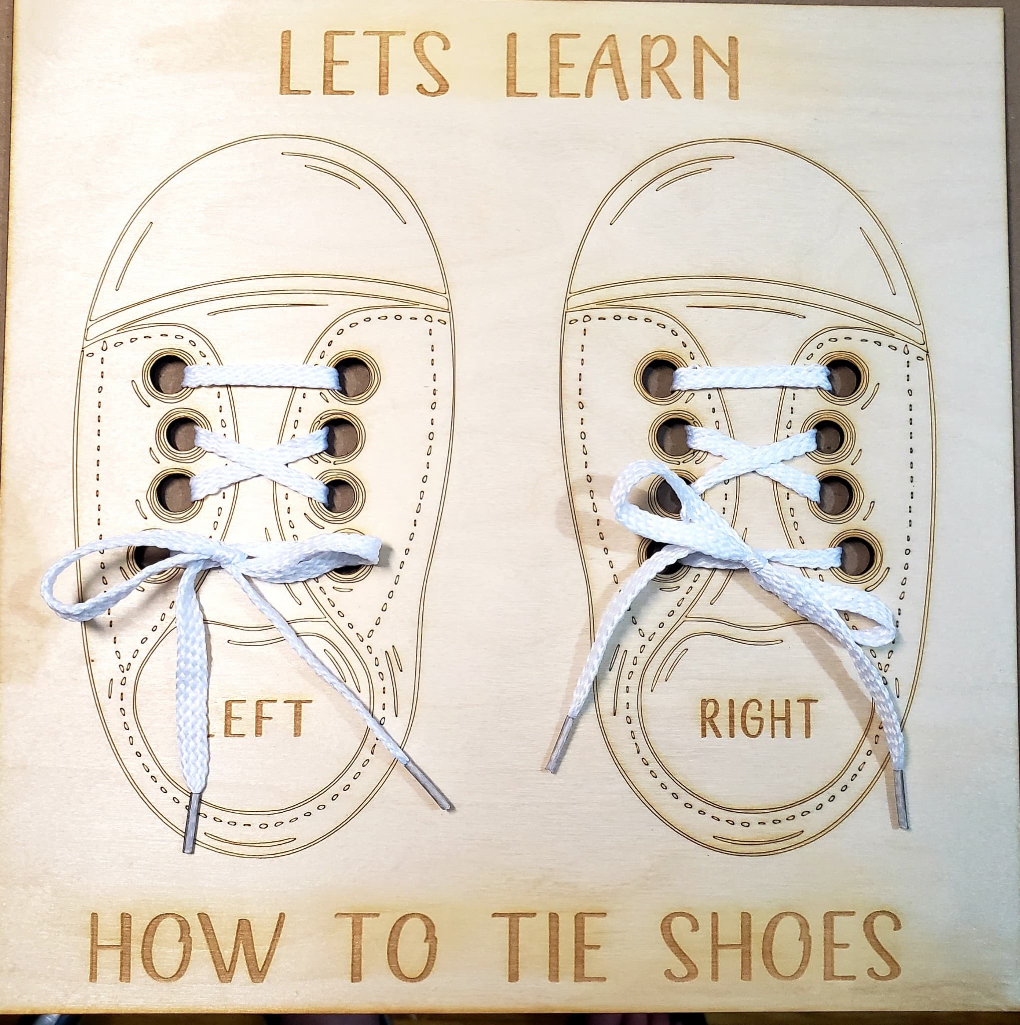 Help your child learn to tie their shoes with this laser-cut, 10.5" x 10.5" Birch Wood Board. It features both the left and right shoe and includes shoelaces for practice. The board is unpainted and unvarnished, so your child can even decorate their own perfect pair of shoes. Order today, and it will be ready to ship in 5-7 days.