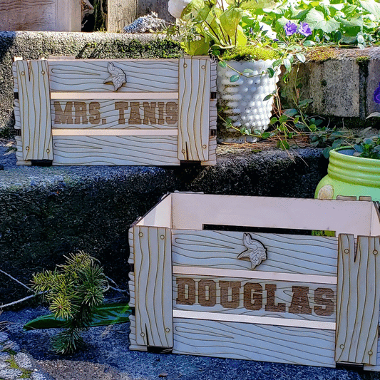 This Wood Grain Crate Personalized provides a special touch for any occasion. Its 10.5" x 8" x 6" birch wood exterior is carved with a unique wood grain motif, and includes a customizable slat and a small token on the top. It's perfect as a birthday, graduation, teacher, or housewarming gift, or as a stylish storage solution. Your name or phrase and a mascot or emblem can be specified in the comments. Made to order, it ships within 5-7 days.