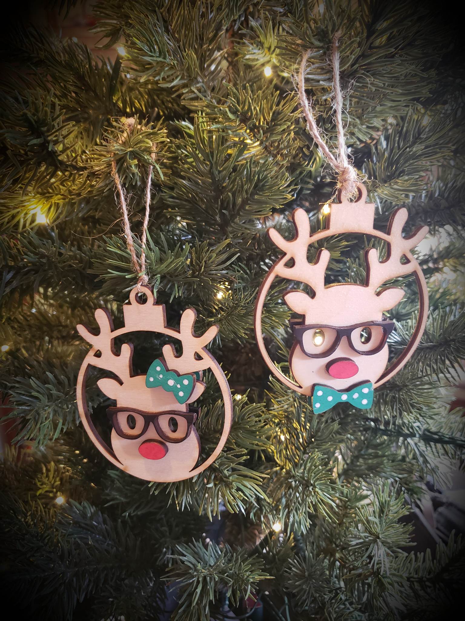  Set your holiday tree apart with this unique Reindeer Ornament with Glasses. Featuring hand-painted accents and your choice of either a Boy or Girl, this 4" ornament is the perfect addition to your holiday décor. Each ornament is custom-made to order so you can be sure it will be ready to ship in 5-7 days. Create a one-of-a-kind look for your home this season with this charming Reindeer Ornament.