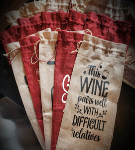 Constructed from sumptuous burlap fabric with a satin corded drawstring, this bag is available in either red or natural. At 6" x 14.4", it is the perfect size to hold a 750ml bottle of wine. This listing is for one wine bag; other items pictured above are for display purposes only and are not included. Your purchase can be expected to ship within 5-7 days.
